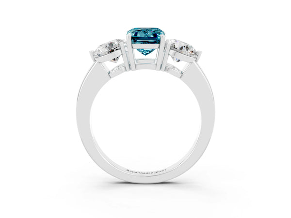 Silver Emerald Cut Blue Topaz Three-Stone Ring with Prong Setting and Classic Band