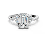 White gold Emerald Cut Brilliant Diamond Solitaire Ring with Pear Side Stones and Four-Prong Setting_12
