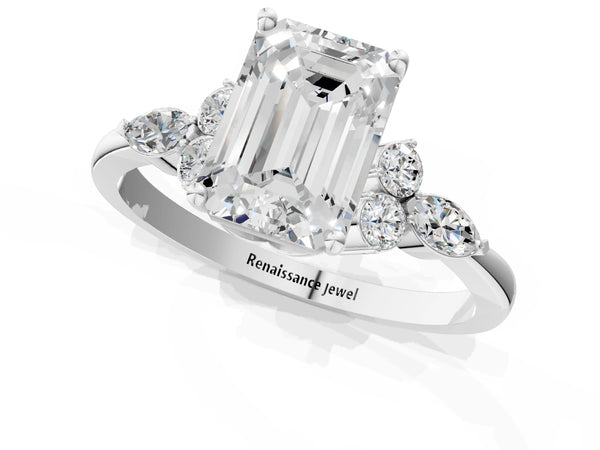 White gold Emerald Cut Brilliant Diamond Solitaire Ring with Pear Side Stones and Four-Prong Setting