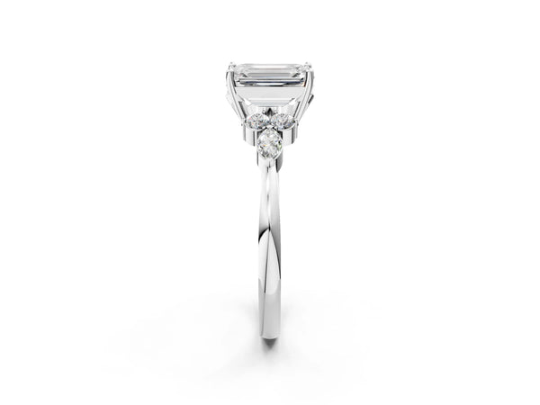 White gold Emerald Cut Brilliant Diamond Solitaire Ring with Pear Side Stones and Four-Prong Setting