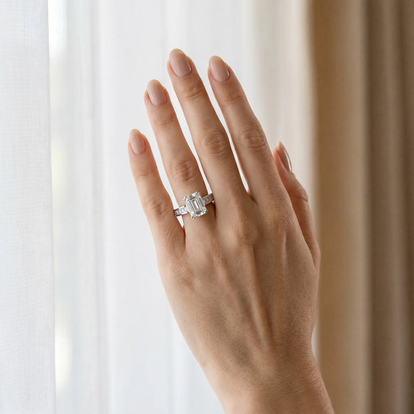 White gold Emerald Cut Channel Set Solitaire Engagement Ring with Prong Setting