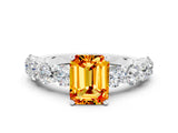 White gold Emerald Cut Citrine Prong Setting with Side Stones on a Pave Band