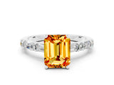 White gold Emerald Cut Citrine Solitaire with Side Baguettes and Channel Set Band
