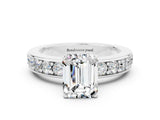 White gold Emerald Cut Cut Channel Set Diamond Engagement Ring with Four-Prong Setting