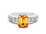 White gold Emerald Cut Cut Channel Set Diamond Engagement Ring with Four-Prong Setting