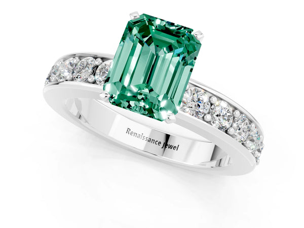 Platinum Emerald Cut Green Sapphire Engagement Ring with Channel Set Round  Band and Prong Setting