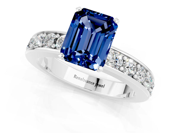 White gold Emerald Cut Blue Sapphire Engagement Ring with Channel Set Round  Band and Prong Setting
