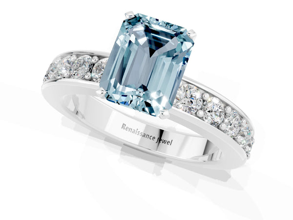 Platinum Emerald Cut Aquamarine Engagement Ring with Channel Set Round  Band and Prong Setting