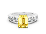 White gold Emerald Cut Cut Channel Set Diamond Engagement Ring with Four-Prong Setting