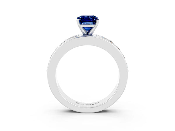 Silver Emerald Cut Blue Sapphire Engagement Ring with Channel Set Round  Band and Prong Setting