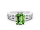 White gold Emerald Cut Cut Channel Set Diamond Engagement Ring with Four-Prong Setting