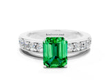 White gold Emerald Cut Cut Channel Set Diamond Engagement Ring with Four-Prong Setting