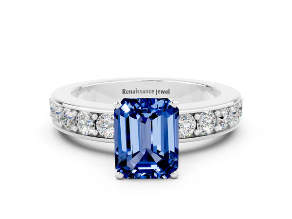 Silver Emerald Cut Blue Sapphire Engagement Ring with Channel Set Round  Band and Prong Setting