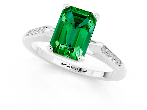 Platinum Emerald Cut Emerald Solitaire Ring with Channel Set Round  Band and Prong Setting