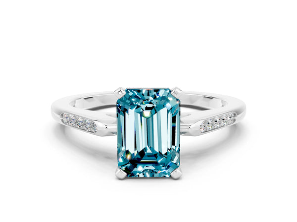 Silver Emerald Cut Blue Topaz Solitaire Ring with Channel Set Round  Band and Prong Setting