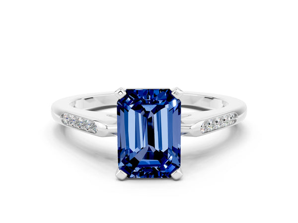 Silver Emerald Cut Blue Sapphire Solitaire Ring with Channel Set Round  Band and Prong Setting