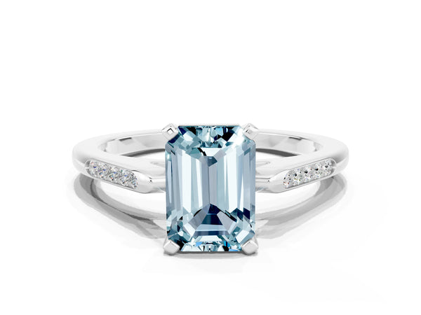 Platinum Emerald Cut Aquamarine Solitaire Ring with Channel Set Round  Band and Prong Setting