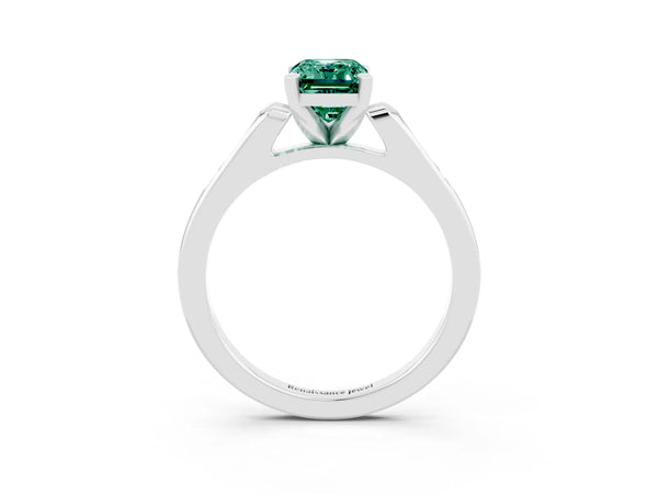 Platinum Emerald Cut Green Sapphire Solitaire Ring with Channel Set Round  Band and Prong Setting