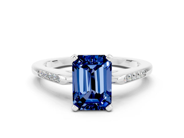 White gold Emerald Cut Blue Sapphire Solitaire Ring with Channel Set Round  Band and Prong Setting