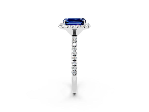 White gold Emerald Cut Blue Sapphire Halo Engagement Ring with Round Pavé Band and Prong Setting