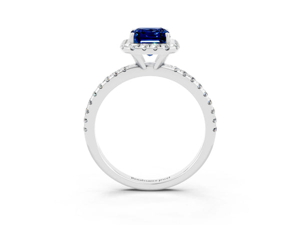 White gold Emerald Cut Blue Sapphire Halo Engagement Ring with Round Pavé Band and Prong Setting