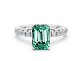 White gold Emerald Cut Cut Diamond Pavé Band with Four-Prong Setting