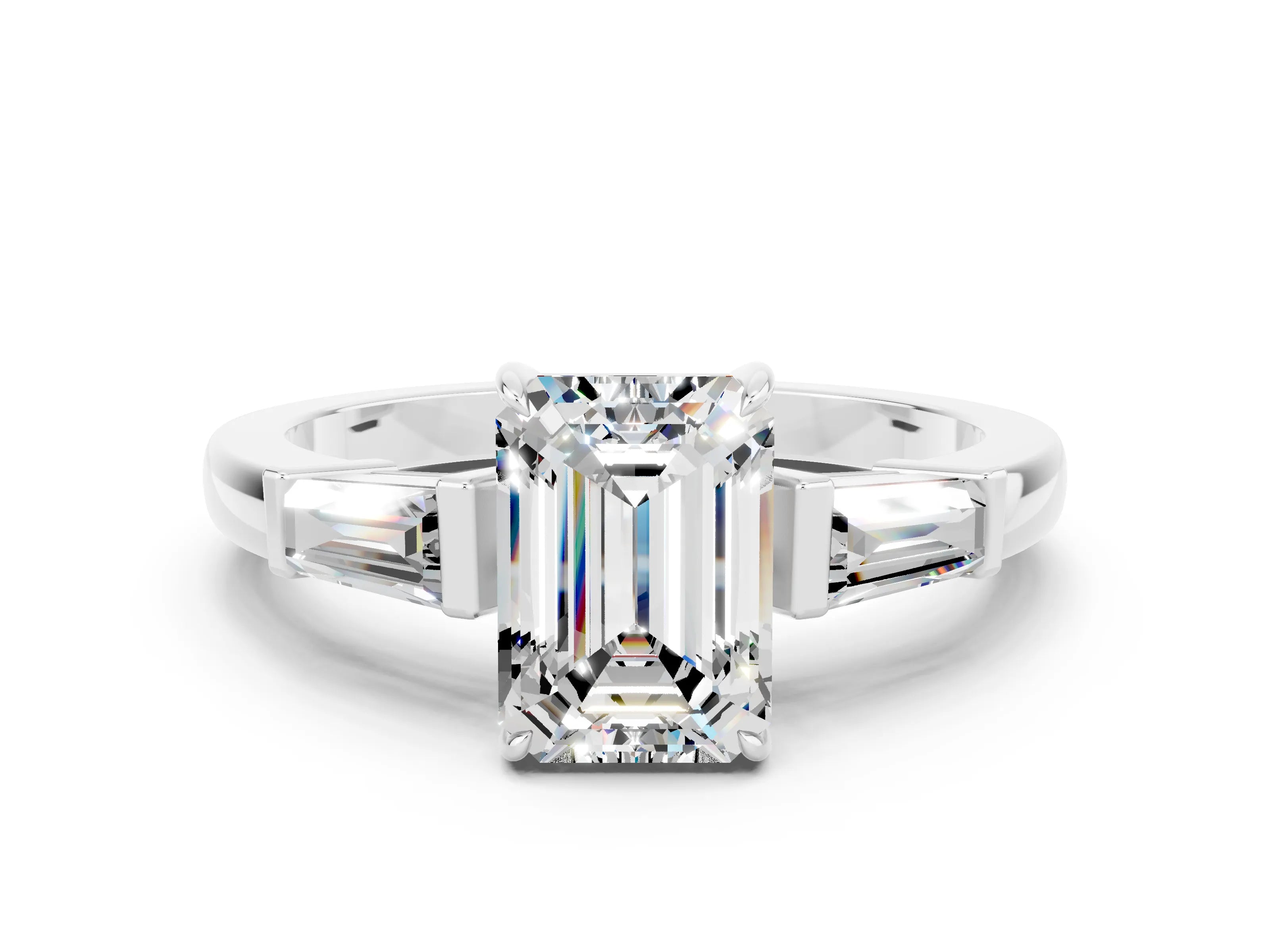 White gold Emerald Cut Cut Diamond Ring with Tapered Baguette Side Stones in Four-Prong Setting