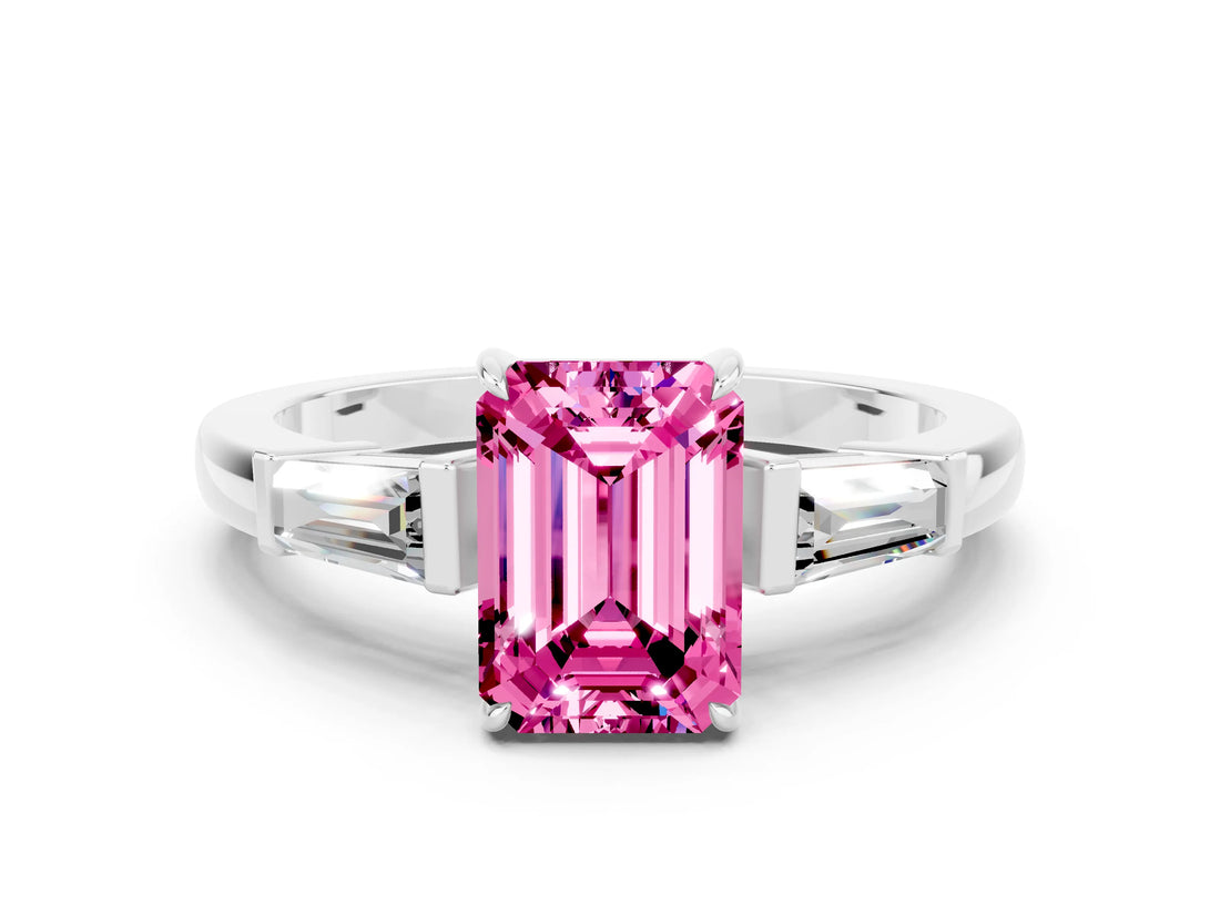White gold Emerald Cut Cut Diamond Ring with Tapered Baguette Side Stones in Four-Prong Setting
