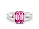 White gold Emerald Cut Cut Diamond Ring with Tapered Baguette Side Stones in Four-Prong Setting