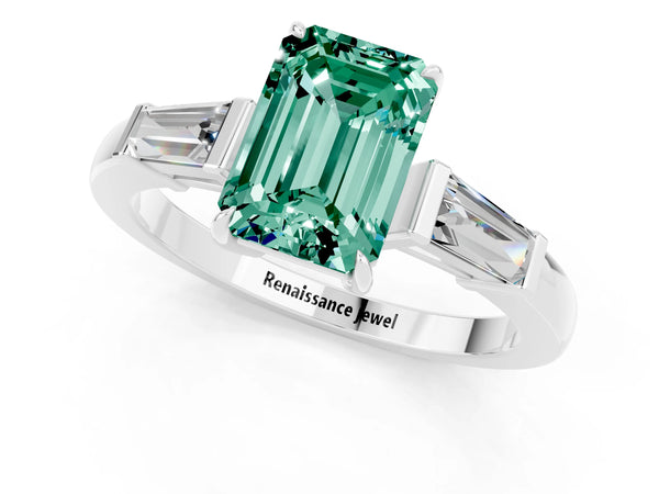Silver Emerald Cut Green Sapphire Three-Stone Ring with Tapered Baguette Side Stones and Prong Setting