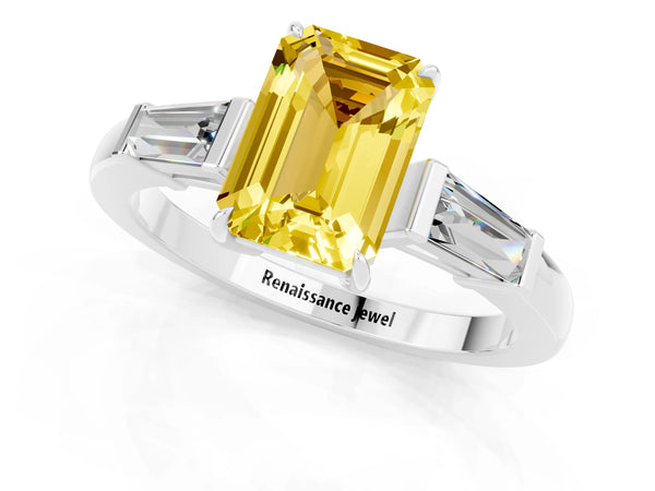 Platinum Emerald Cut Yellow Sapphire Three-Stone Ring with Tapered Baguette Side Stones and Prong Setting