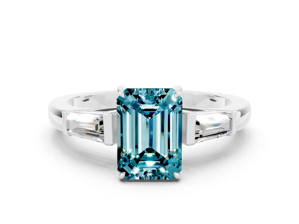 Silver Emerald Cut Cut Diamond Ring with Tapered Baguette Side Stones in Four-Prong Setting
