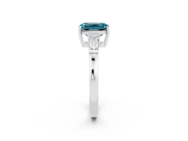 White gold Emerald Cut Cut Diamond Ring with Tapered Baguette Side Stones in Four-Prong Setting