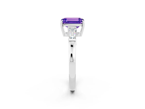 Platinum Emerald Cut Tanzanite Three-Stone Ring with Tapered Baguette Side Stones and Prong Setting