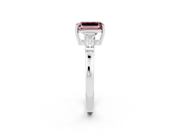 Platinum Emerald Cut Cut Diamond Ring with Tapered Baguette Side Stones in Four-Prong Setting