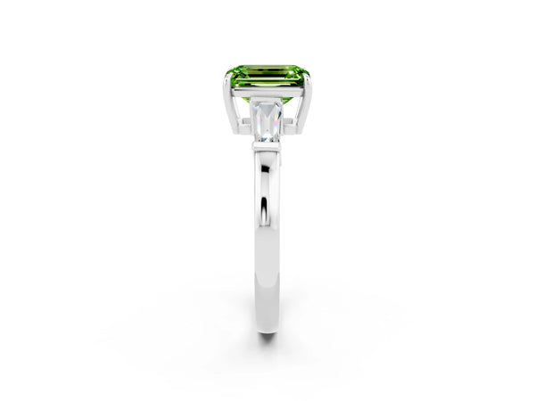 White gold Emerald Cut Cut Diamond Ring with Tapered Baguette Side Stones in Four-Prong Setting