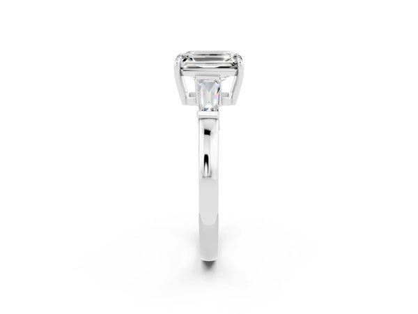 White gold Emerald Cut Moissanite Three-Stone Ring with Tapered Baguette Side Stones and Prong Setting