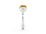 White gold Emerald Cut Cut Diamond Ring with Tapered Baguette Side Stones in Four-Prong Setting_2