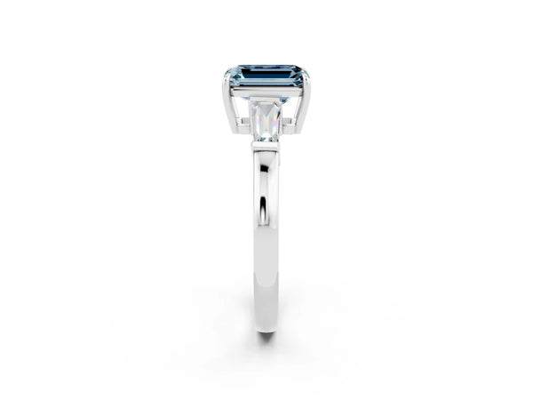 Platinum Emerald Cut Aquamarine Three-Stone Ring with Tapered Baguette Side Stones and Prong Setting