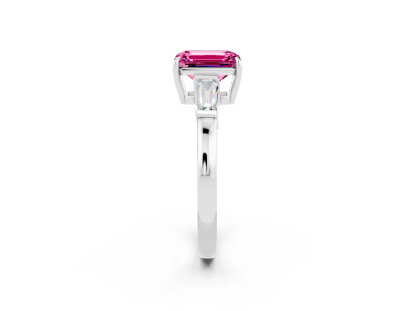 White gold Emerald Cut Pink Sapphire Three-Stone Ring with Tapered Baguette Side Stones and Prong Setting