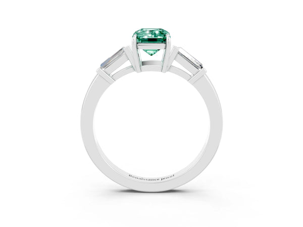 Silver Emerald Cut Green Sapphire Three-Stone Ring with Tapered Baguette Side Stones and Prong Setting
