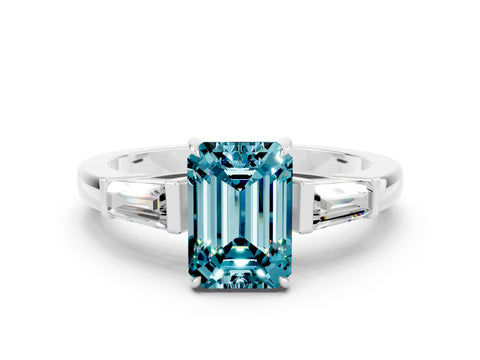 White gold Emerald Cut Cut Diamond Ring with Tapered Baguette Side Stones in Four-Prong Setting