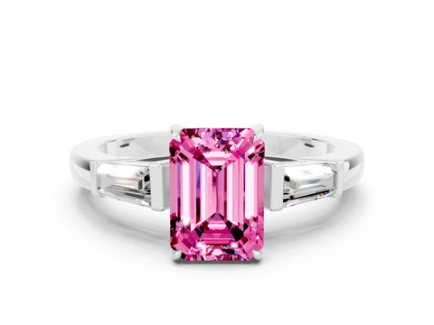 White gold Emerald Cut Cut Diamond Ring with Tapered Baguette Side Stones in Four-Prong Setting