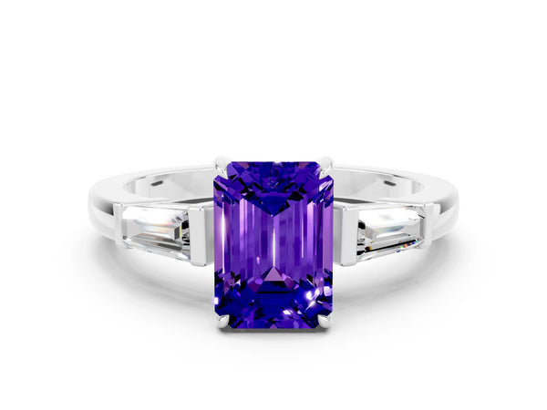 Platinum Emerald Cut Tanzanite Three-Stone Ring with Tapered Baguette Side Stones and Prong Setting