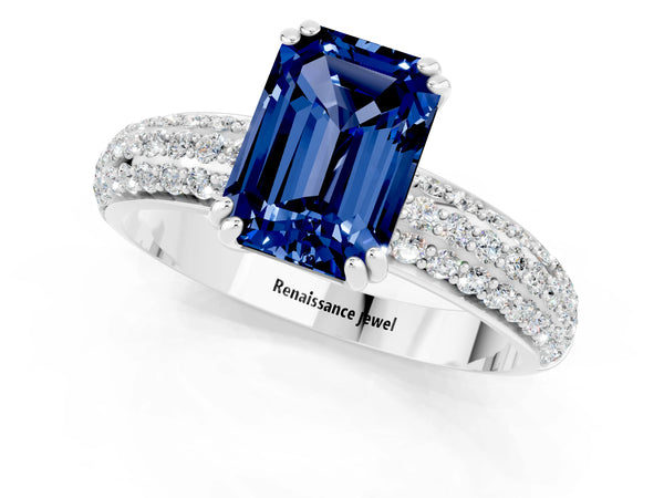 Silver Emerald Cut Blue Sapphire Solitaire Ring with Multi-Row Round Pavé Band and Prong Setting
