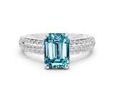 White gold Emerald Cut Cut Pave Diamond Engagement Ring with Channel Set Band and Four-Prong Setting