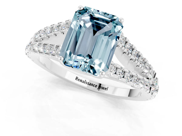 White gold Emerald Cut Aquamarine Split Shank Engagement Ring with Round Pavé and Prong Setting