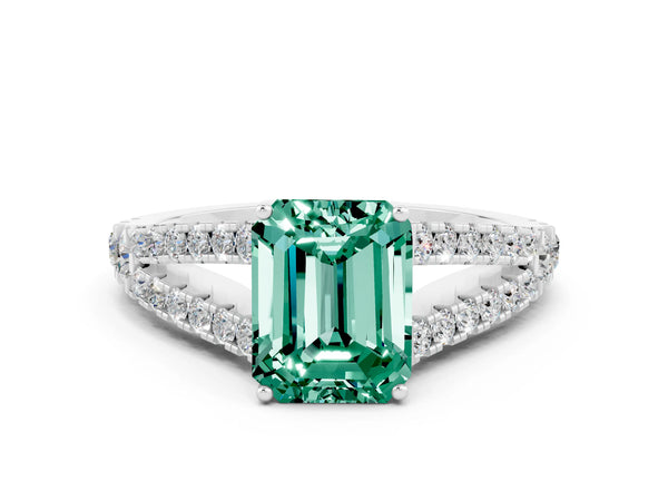 Platinum Emerald Cut Green Sapphire Split Shank Engagement Ring with Round Pavé and Prong Setting