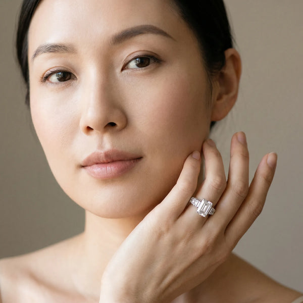 White gold Emerald Cut Diamond Classic Solitaire Ring with Pavé Band and Four-Prong Setting