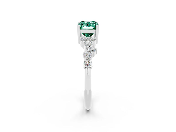 Platinum Emerald Cut Green Sapphire Scattered Round Accent Ring with Prong Setting
